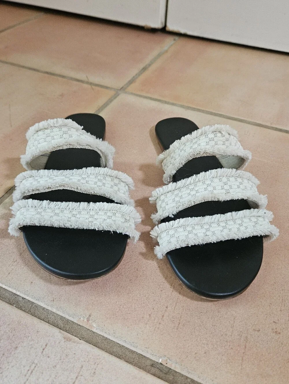 Rothy’s Triple Band Sandals in Seashell Fringe